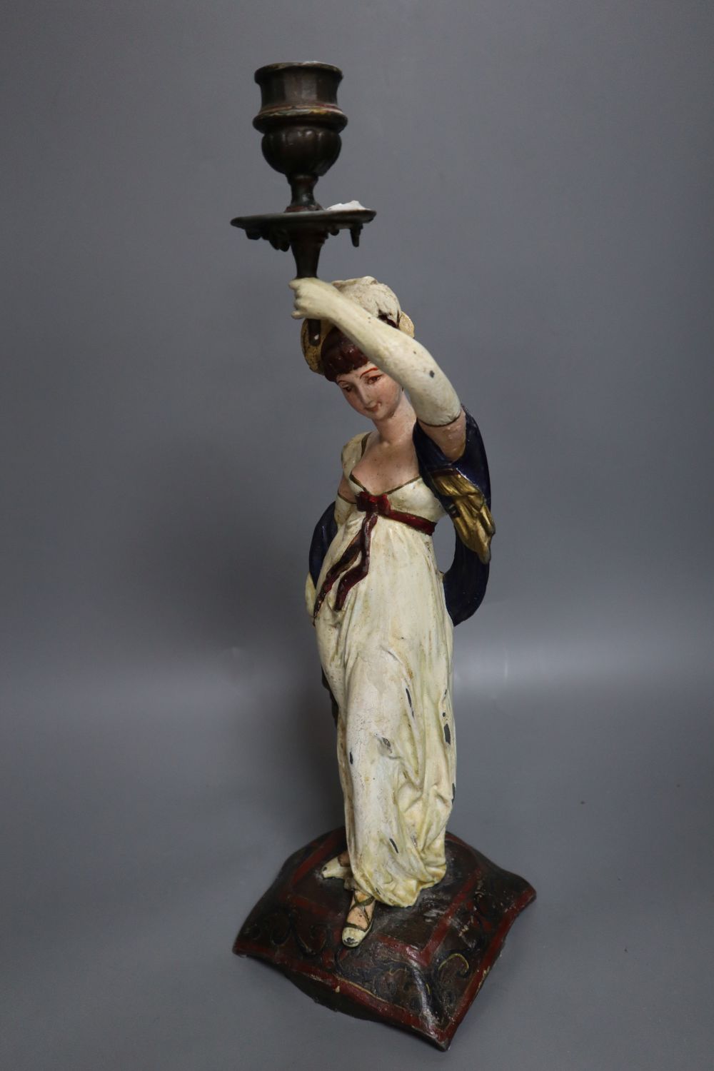 A pair of late 19th century French spelter figural candlesticks, height 41cm